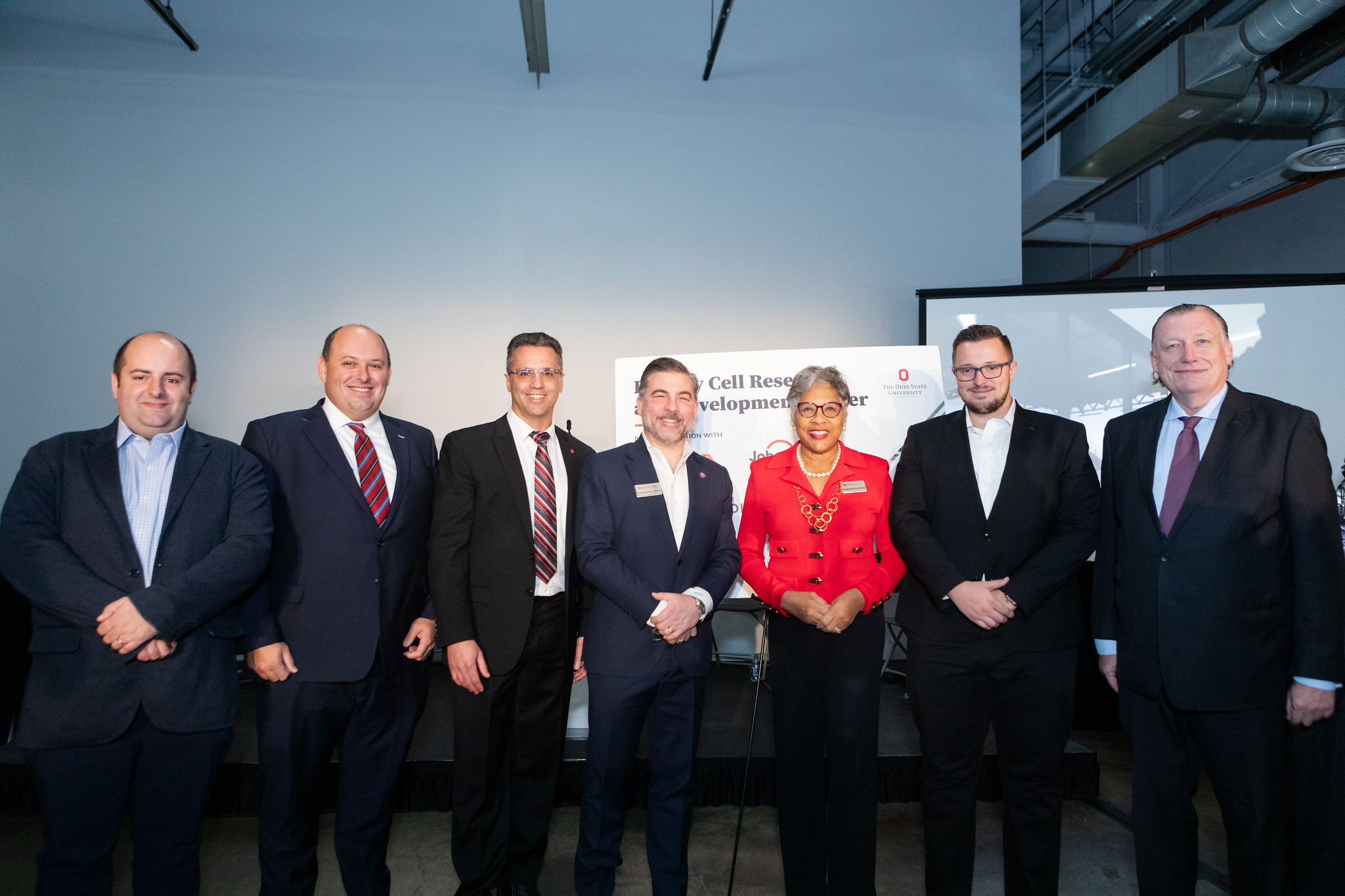 Ohio State's Battery Center acting director Jay Sayre, with Congresswoman Joyce Beatty, Congressman Mike Carey, Coatema’s VP Thomas Kolbusch and the next Machinery Group team led by Tomi Belosevic at the announcement ceremony in Columbus, OH Photo credit Emma Parker