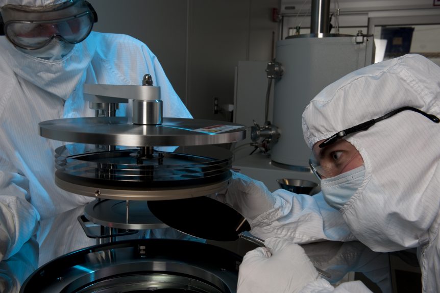 Researchers at Nanotech West Lab working in the cleanroom.