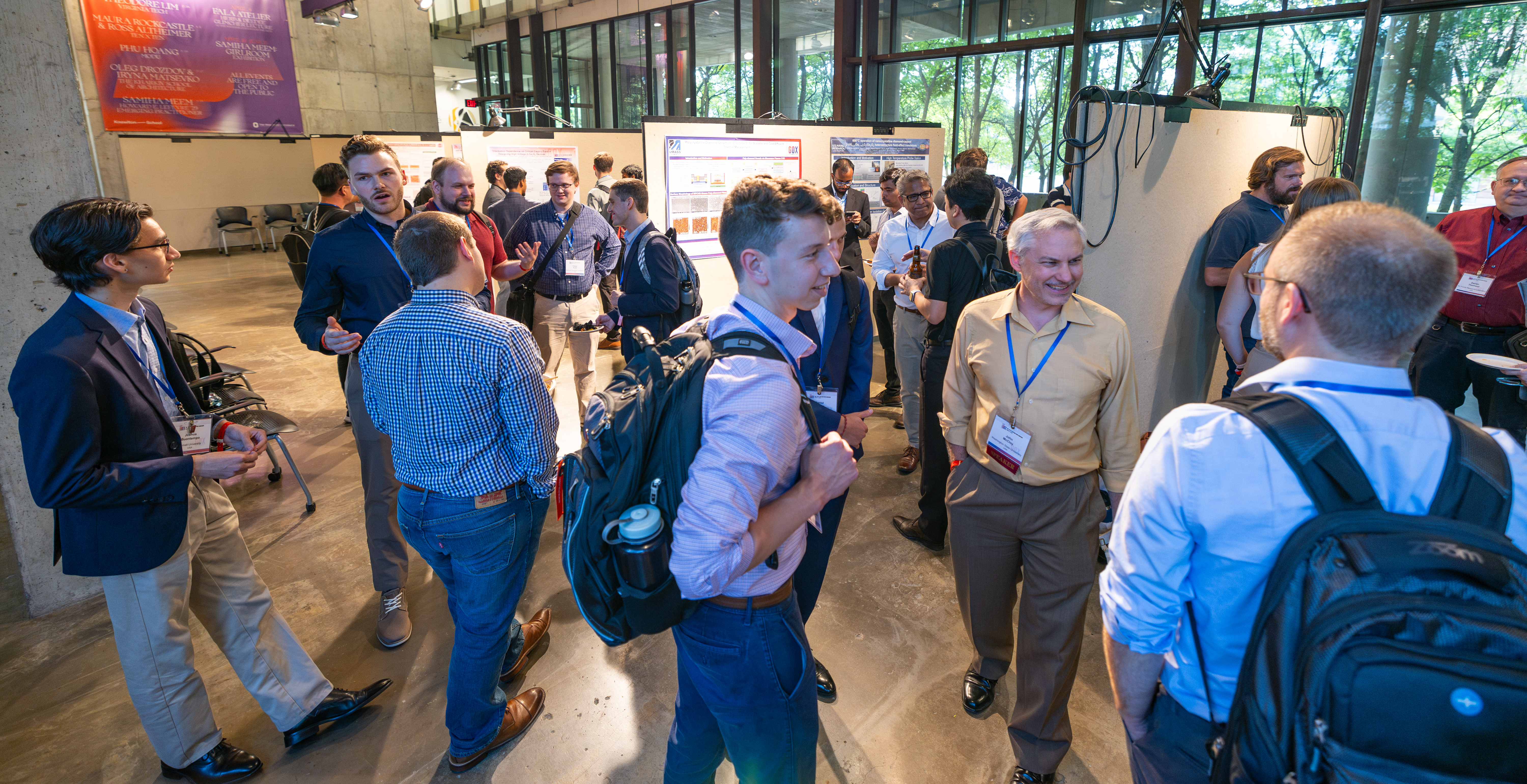 Attendees gather for a student poster session during GOX 2024 at Ohio State's Knowlton Hall.