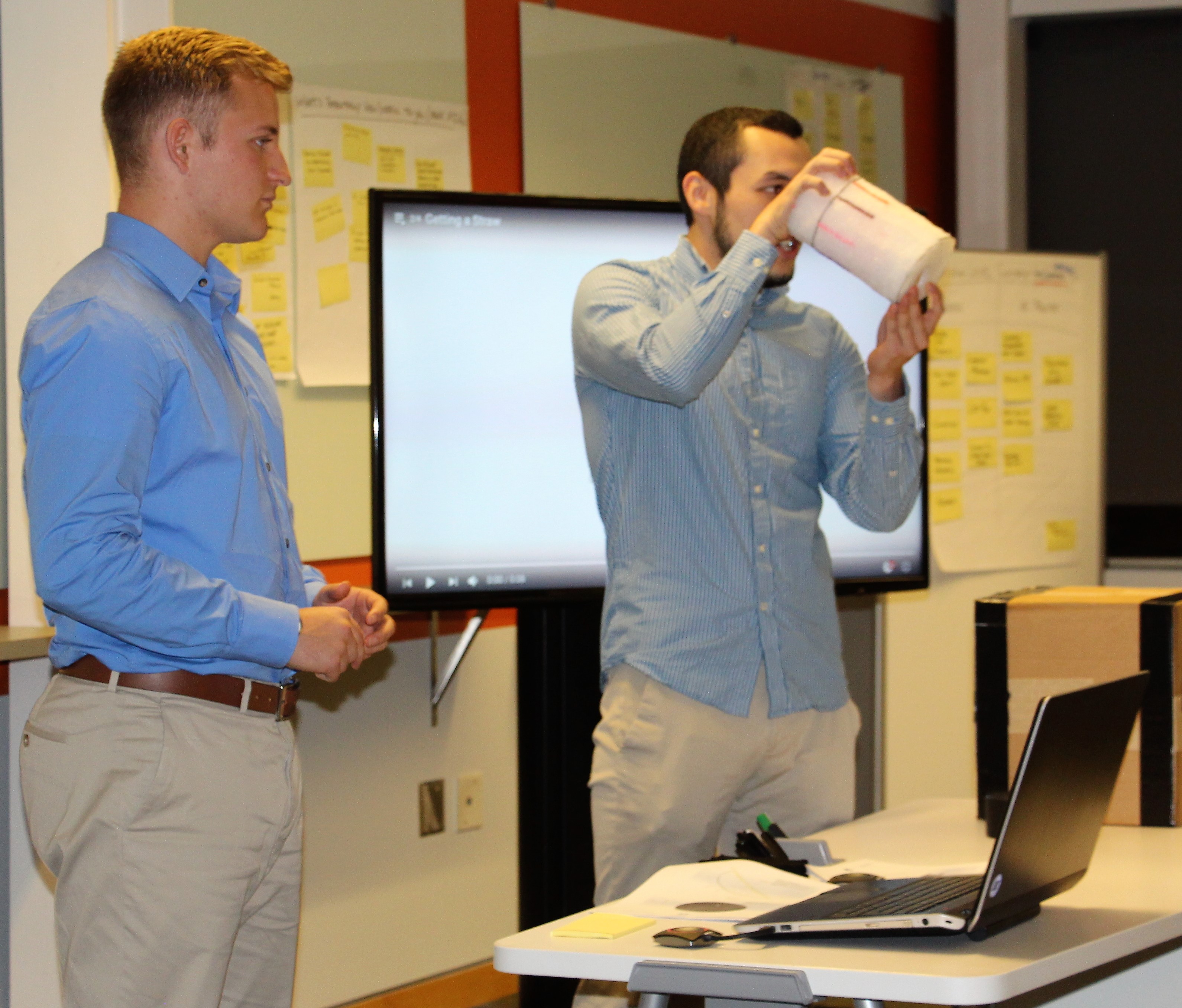An ENGR 2367 class design team shows their prototype for the design challenge.
