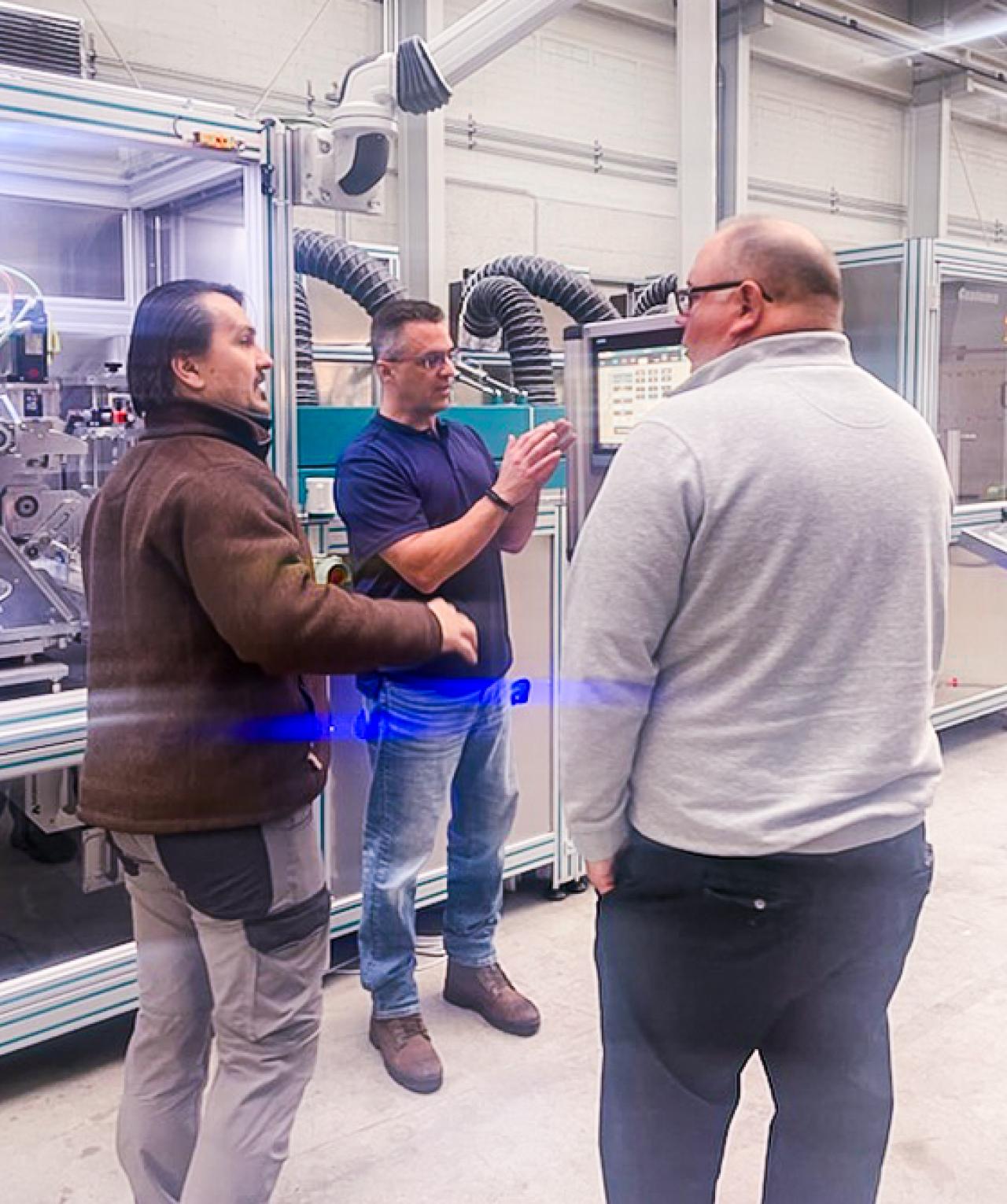 IMR staff visit Coatema in Germany to inspect new machinery.