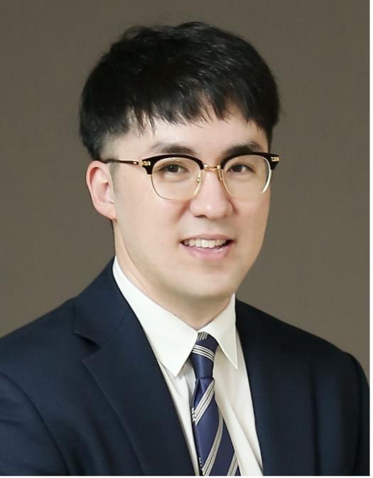 Headshot of man in suite