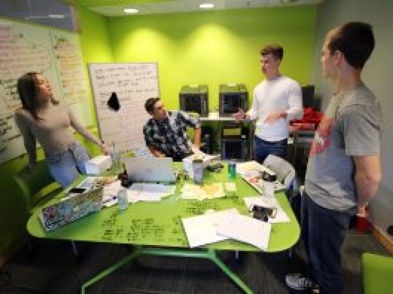 Students in a green room talking