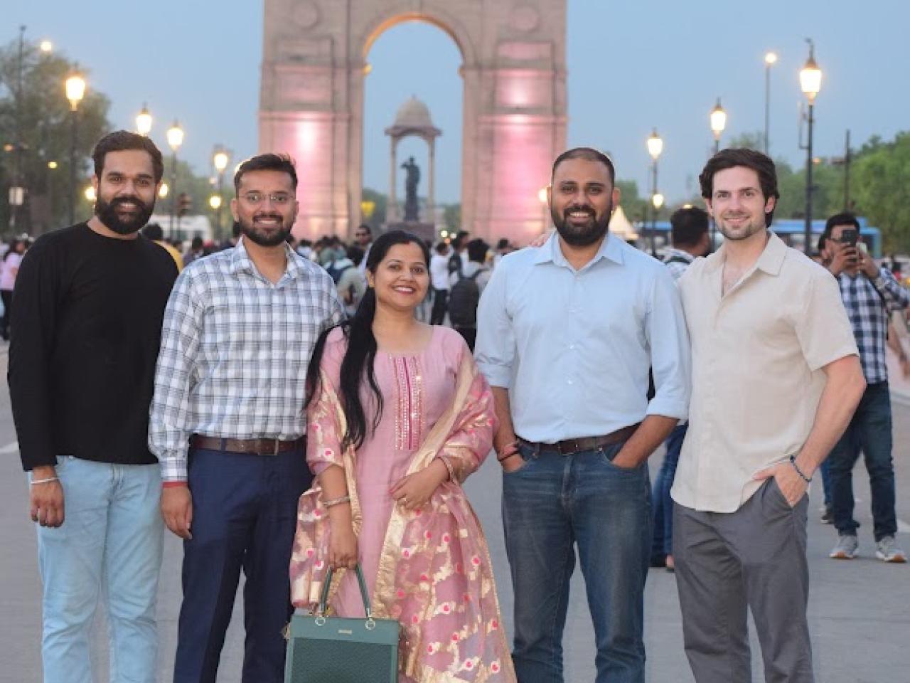 Nathan Gajowsky and 4 other people standing in front of a temple