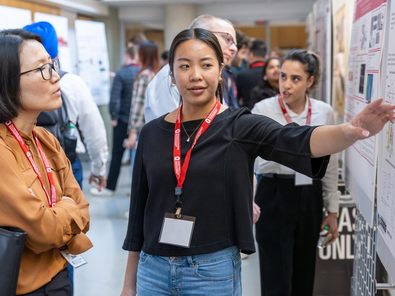 Student presents a research poster during the 2025 Materials and Manufacturing Conference.