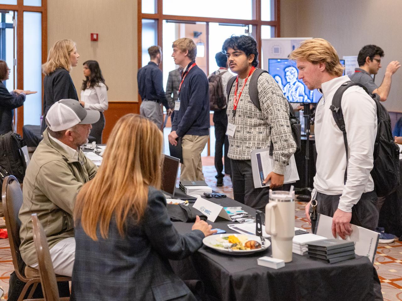 Students at a networking portion of the MIST event.