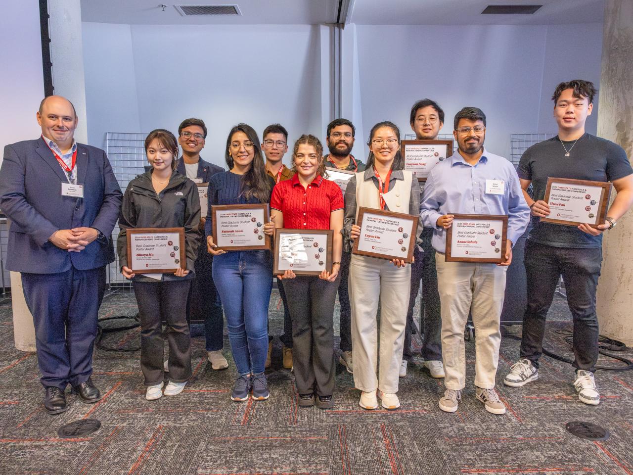 Top poster presenters receive their awards at MMC '26.