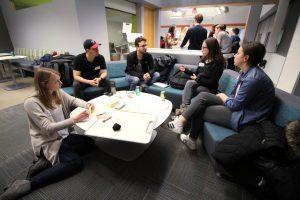 Students sitting on a couch talking