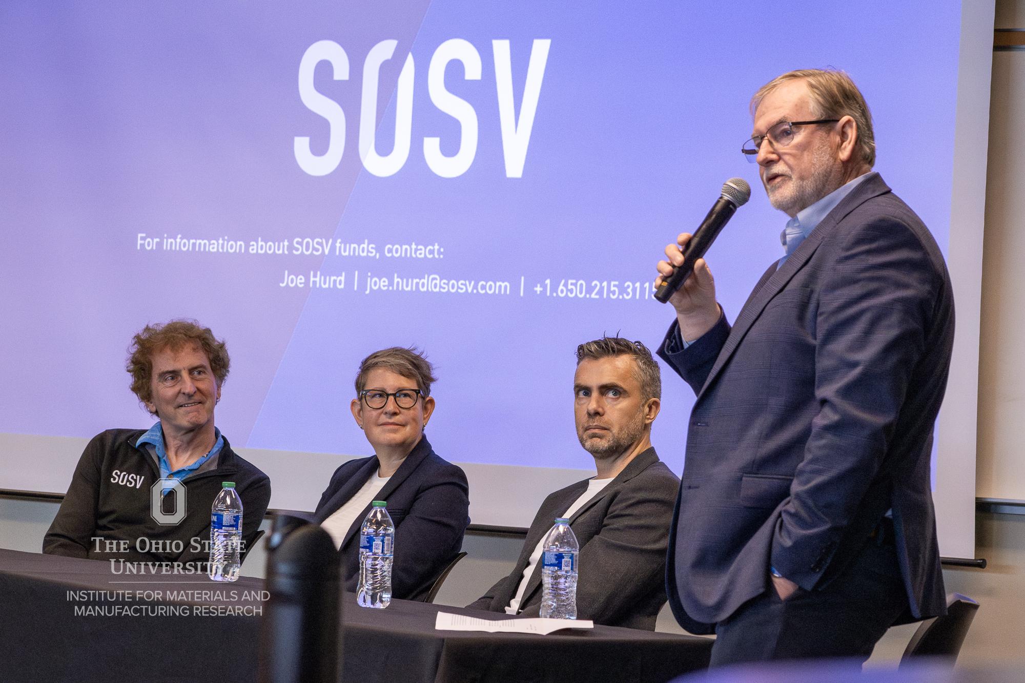 SOSV panel speaking with microphone