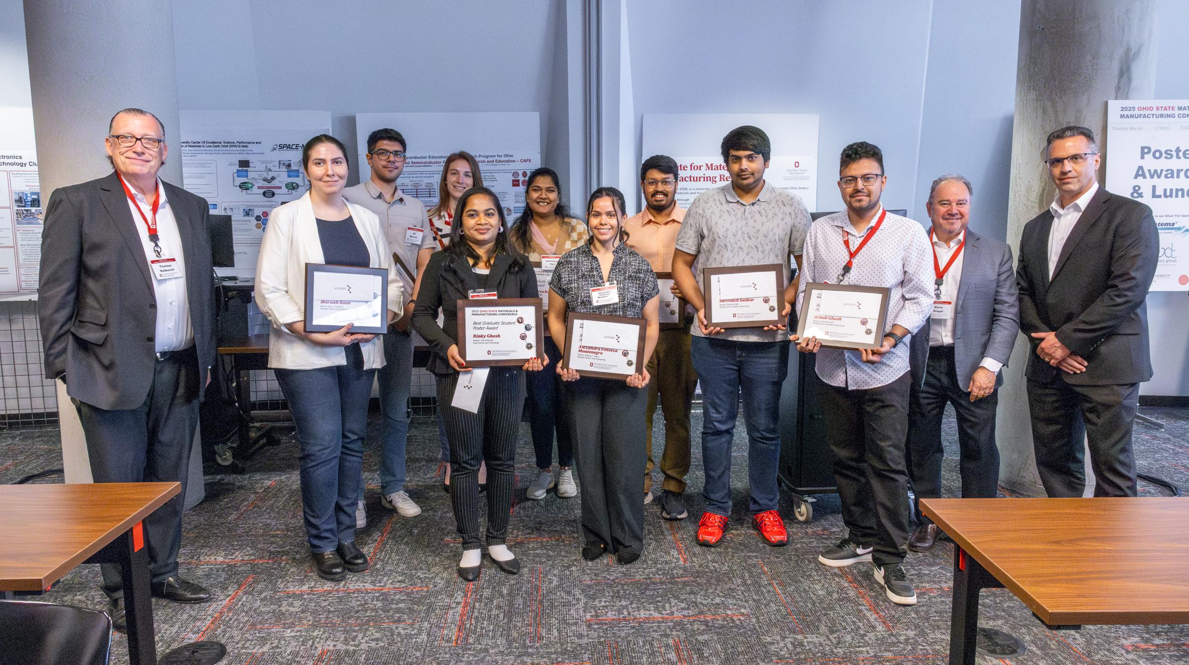 The top ten poster presenters receive their awards at MMC '25.
