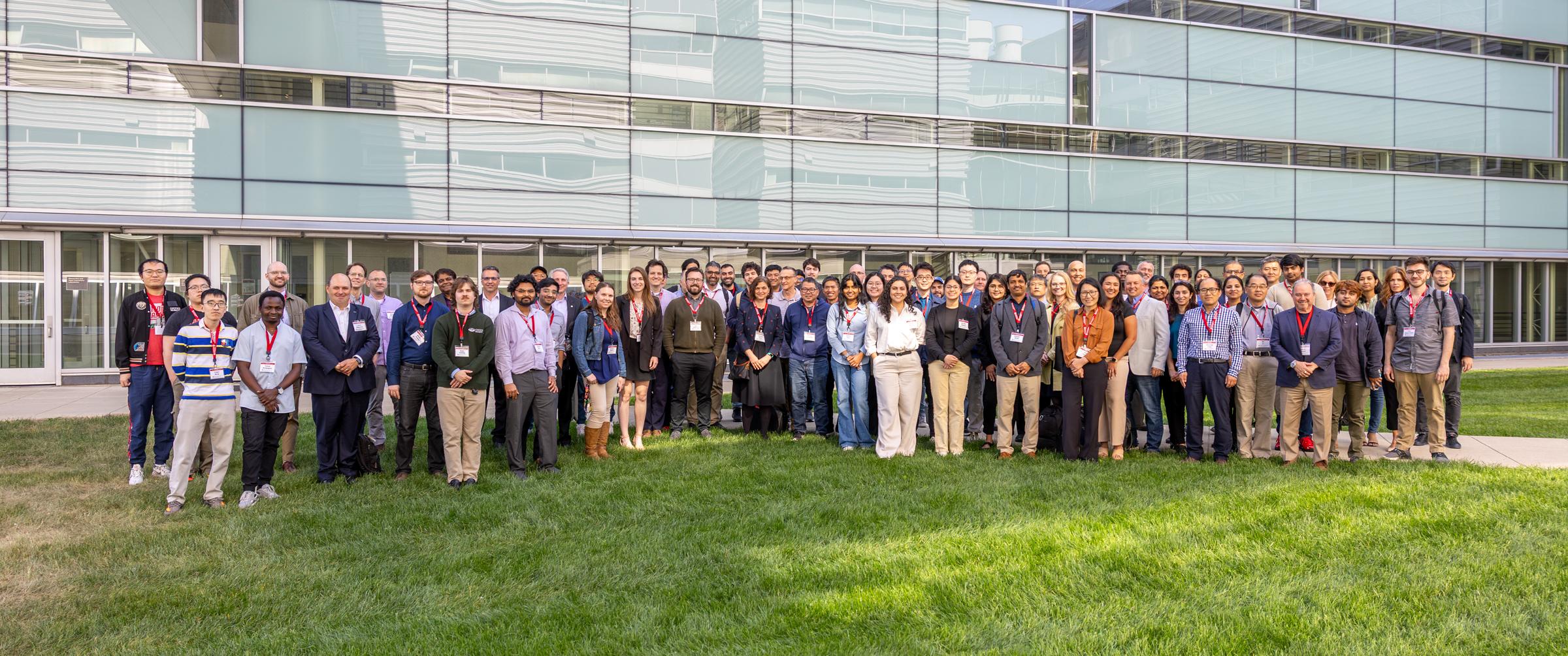 Attendees of MMC '25 gather for a group photo outside Ohio State's Scott Lab.