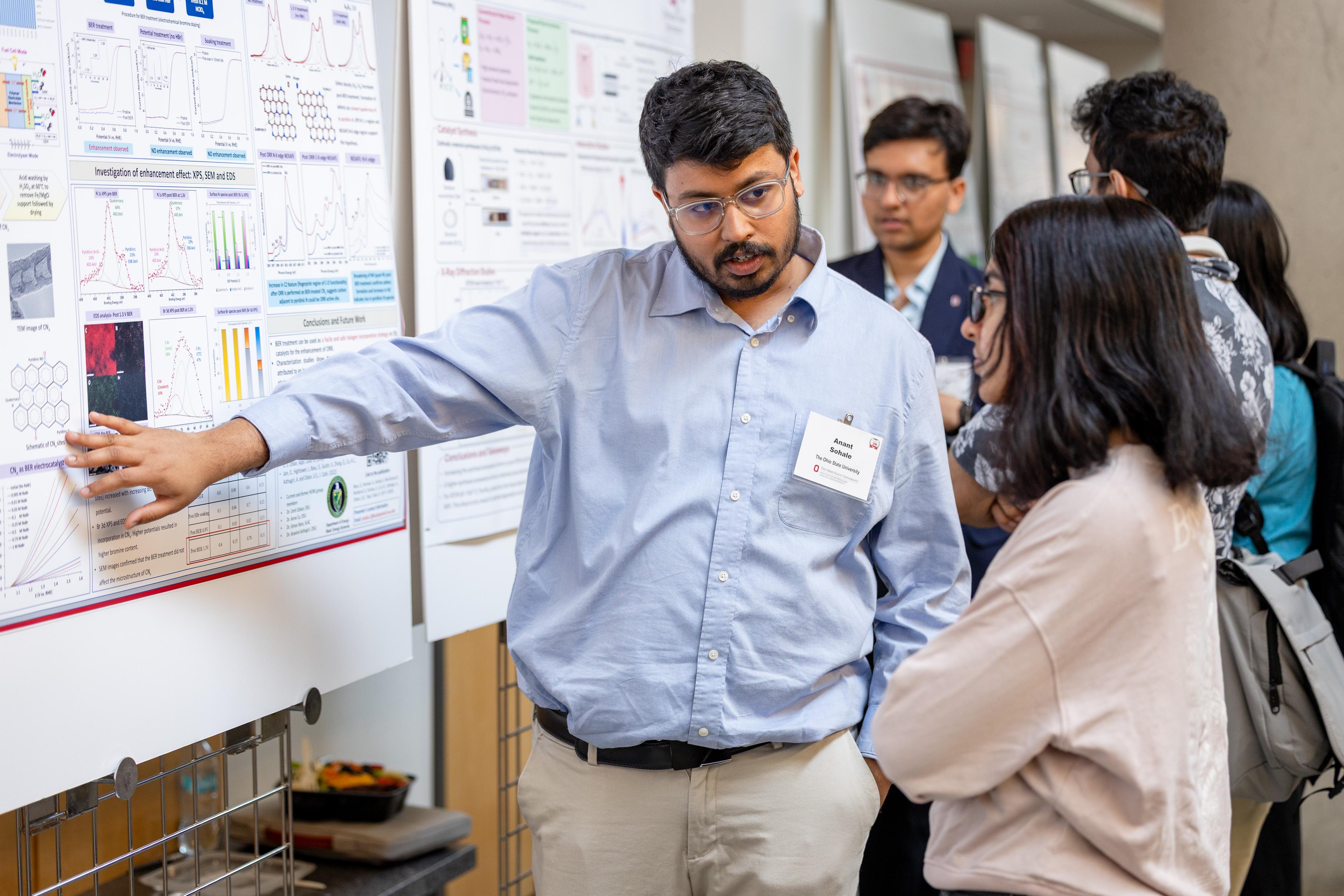 Student presenting a research poster at MMC '26.