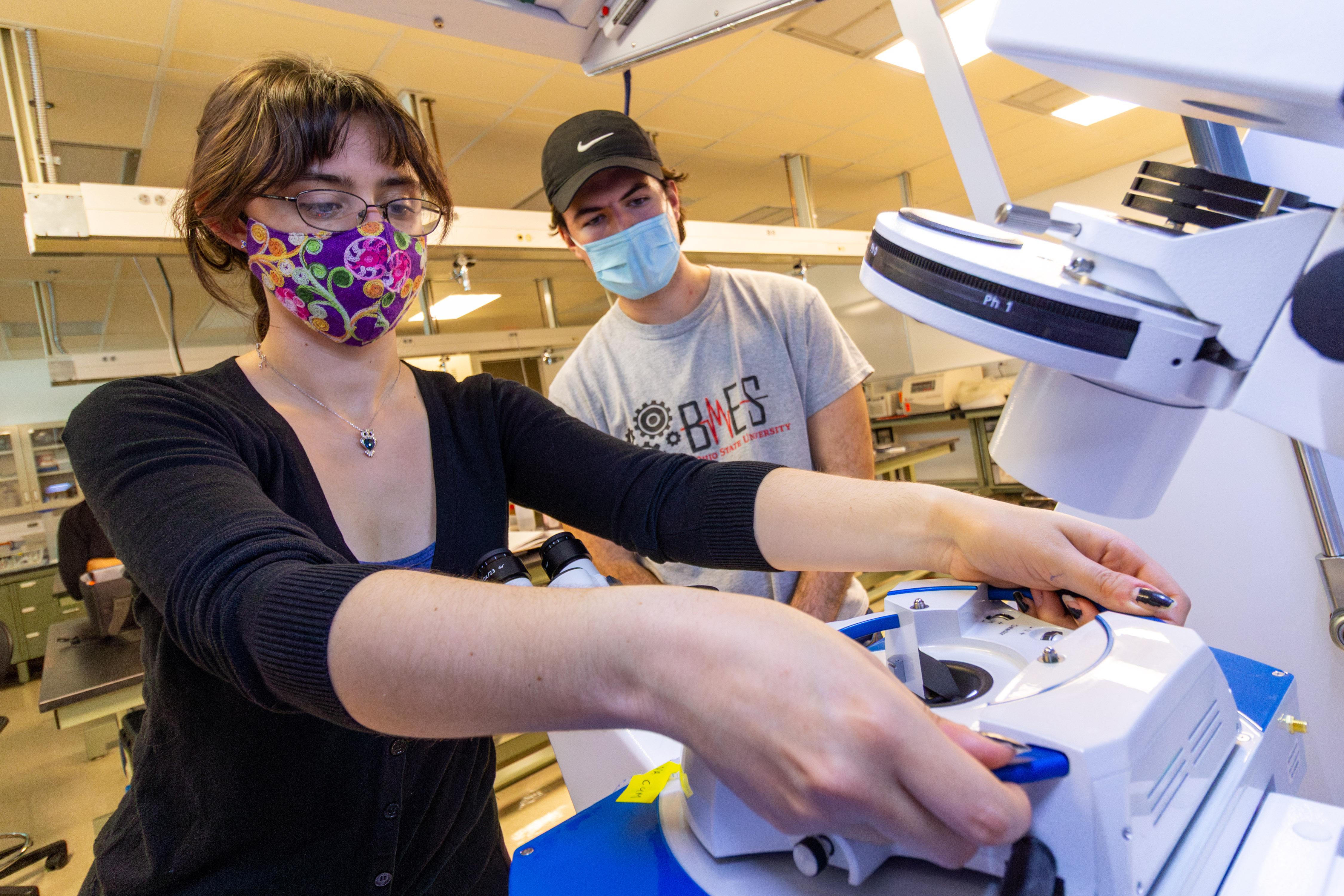 Two students working in the Bio AFM Lab at Ohio State's Scott Laboratory. 