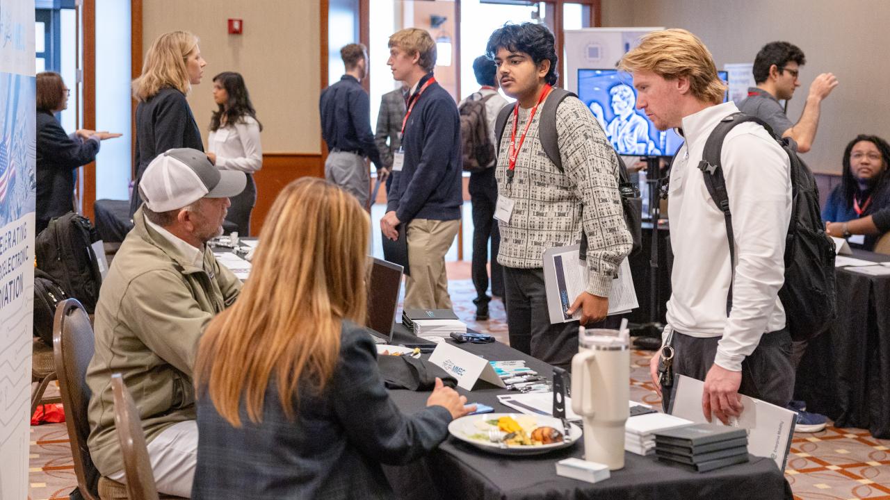 Students at a networking portion of the MIST event.